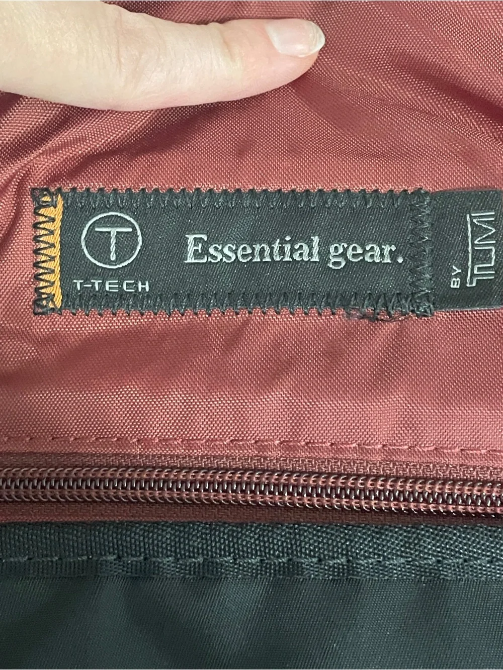 Tumi Black Messenger Bag with Red Interior